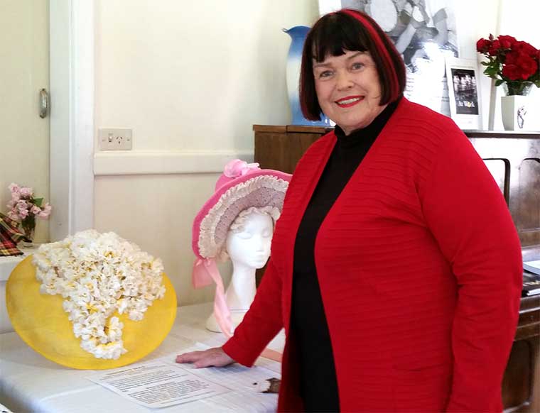 Mayor Anne Ferguson with a sinimay hat she made in 2007 as a millinery student at TAFE