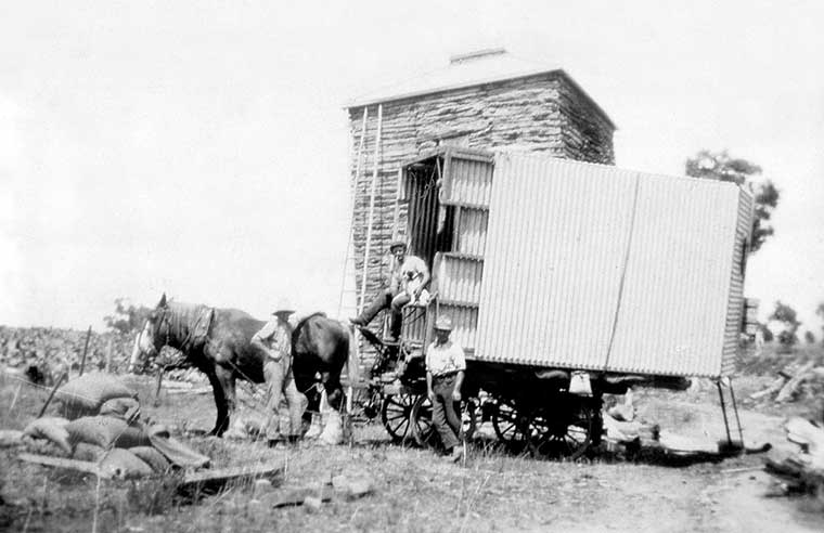 Barn on trolley, kiln in background