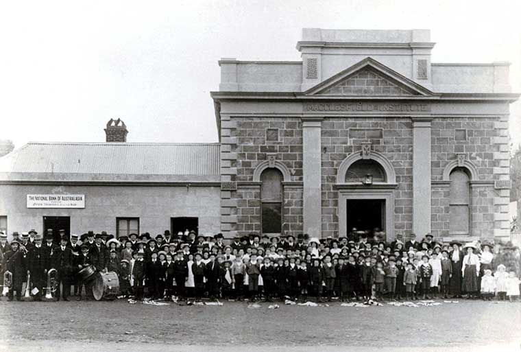 Macclesfield community celebrating the coronation of Edward VII outside the Institute Building